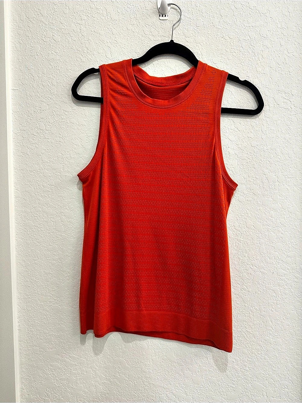 Lululemon Breeze By Muscle Tank (in the Brick Orange / Squad colorway)